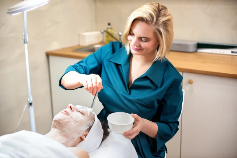 Topaz practitioner applying a customized facial treatment