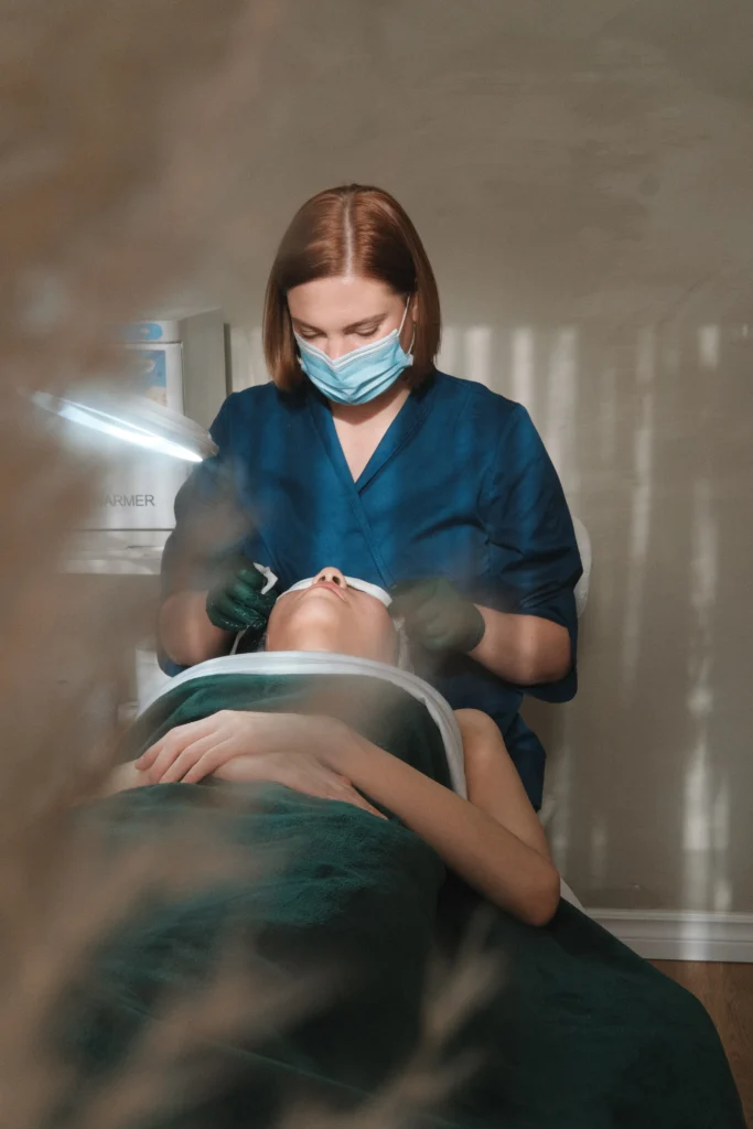 Topaz practitioner performing an advanced facial treatment.